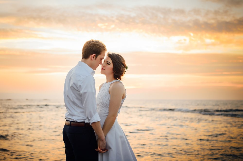 bride and groom on beach elopement