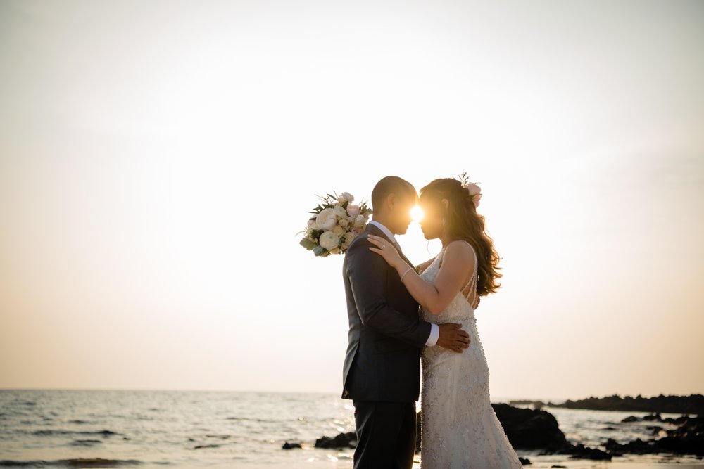 wedding couple at the beach with gorgeous sunset light
