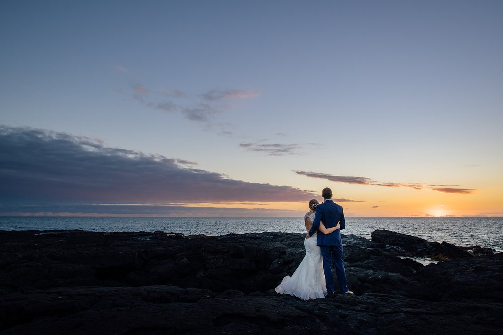 sweet bride and groom during Hawaii sunset