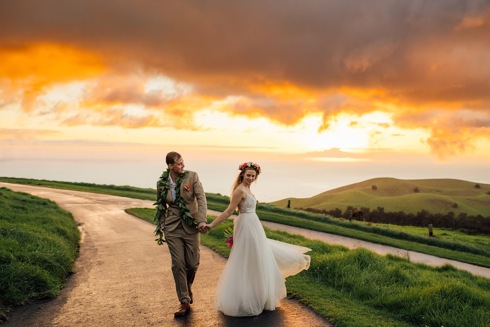 couple dancing during sunset at Kahua Ranch