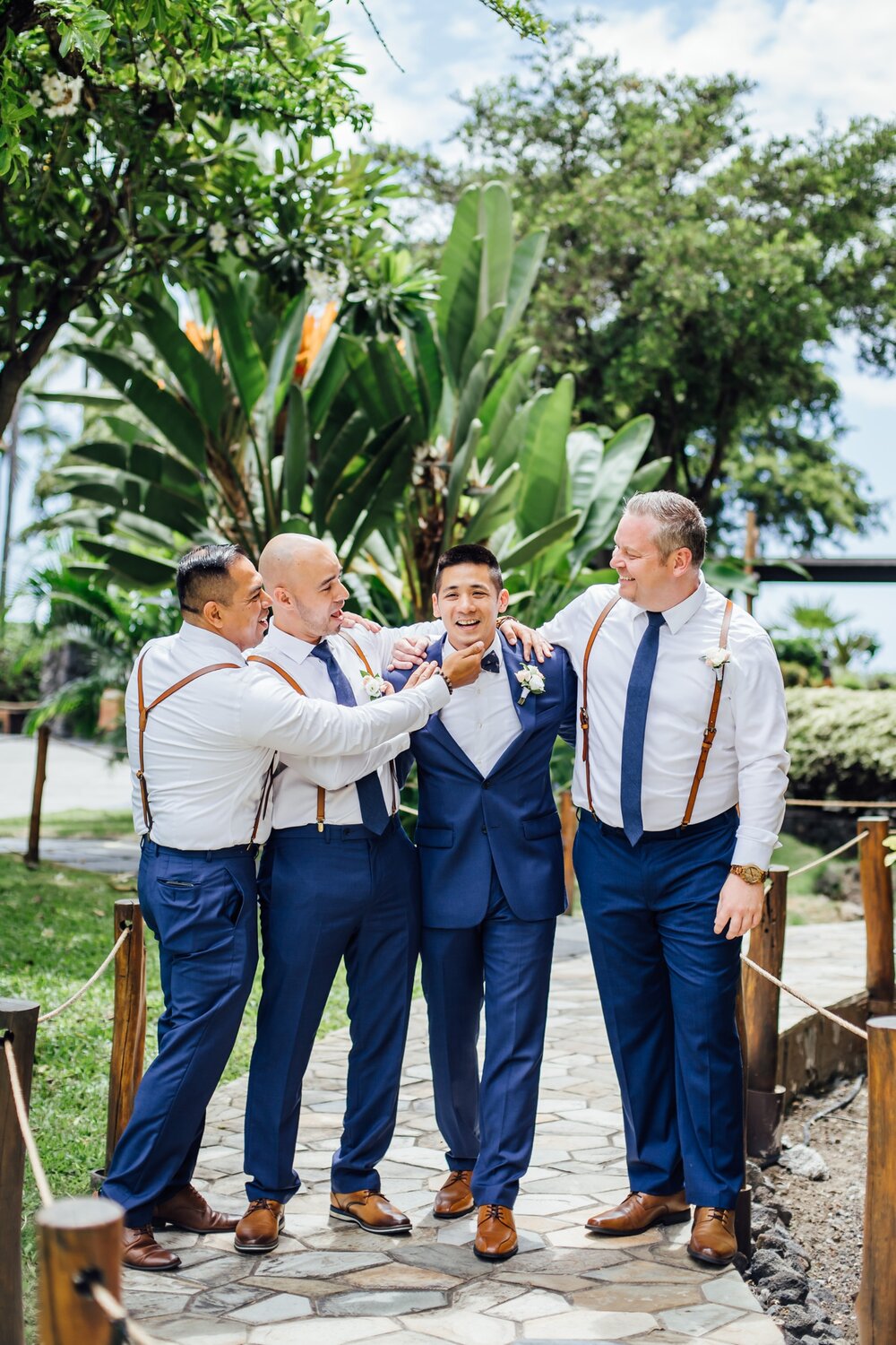 groom with his groomsmen during his Big Island wedding