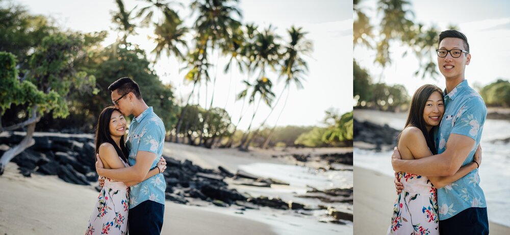 Couples against the palm trees at sunset at Mahaiula beach for their engagement session