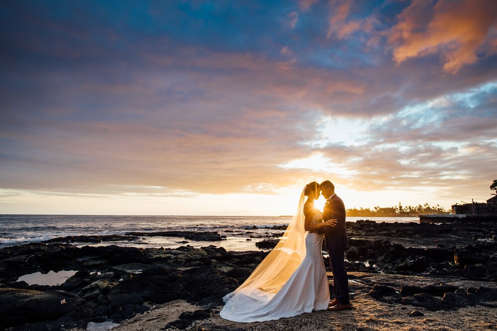 sunset portrait of the newlyweds by Big Island wedding photographer