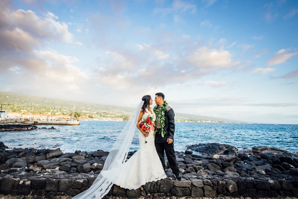 Kona Marriott wedding with Bride and Groom on lava rock 