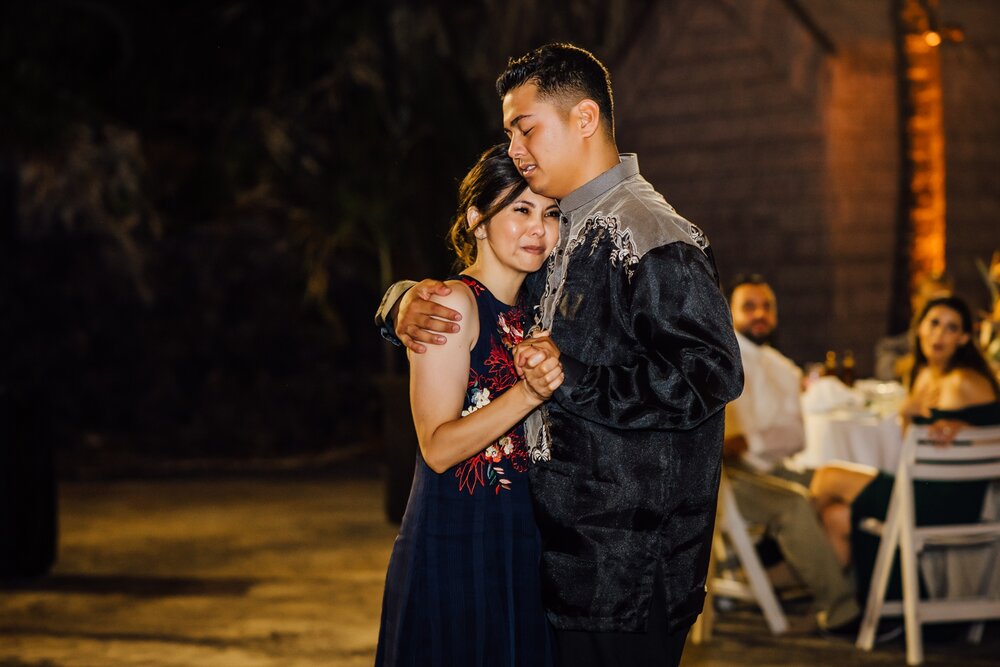 emotional Mother and son dance at a wedding day in hawaii, hawaii wedding photographer