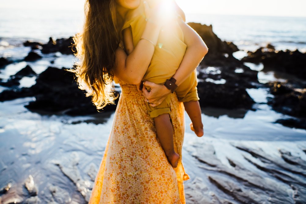 mama and baby at their westin hapuna beach family session