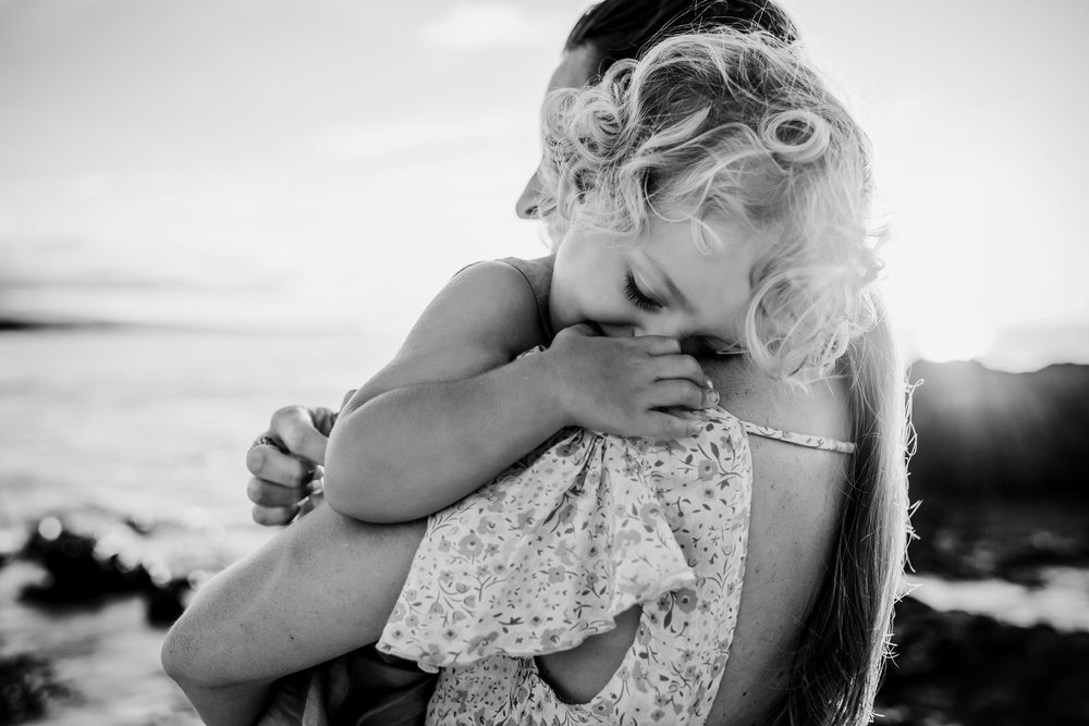 mama and baby at their hapuna beach family session