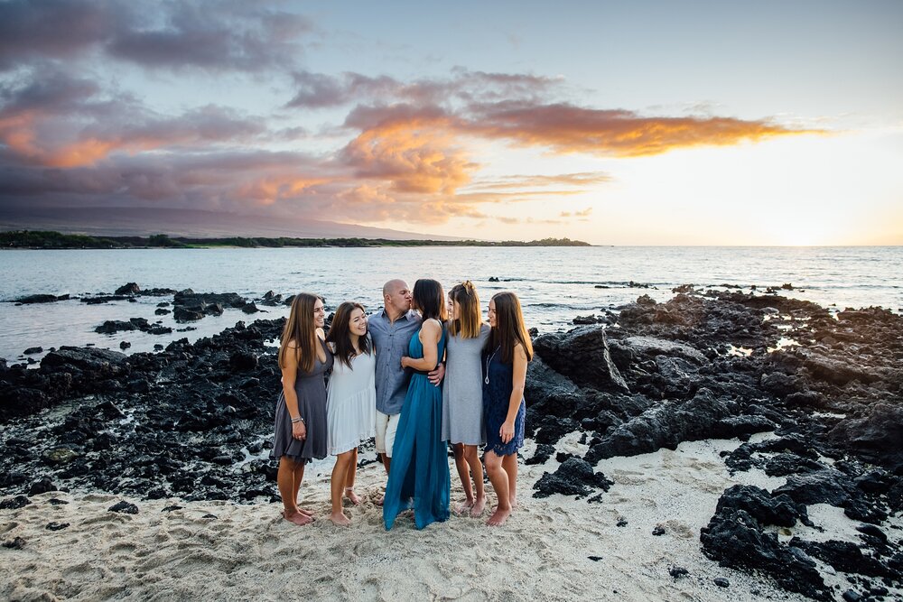 family during Hawaii golden hour at the beach