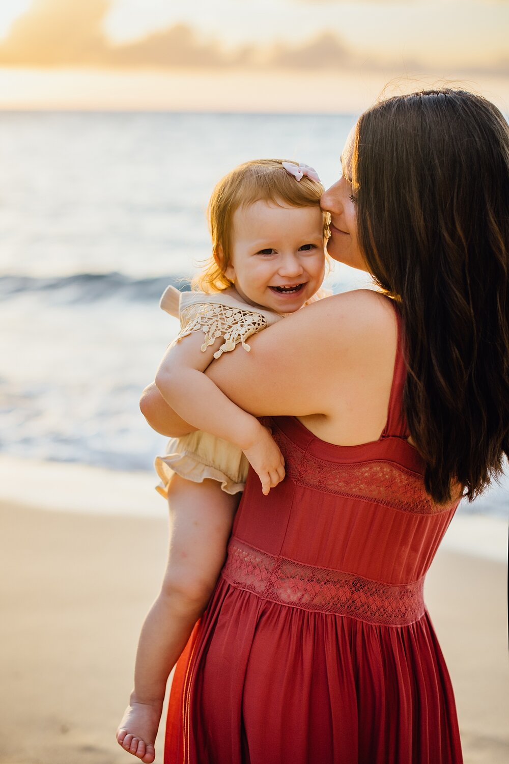 sweet moments of mom and daughter by Hawaii family photographer