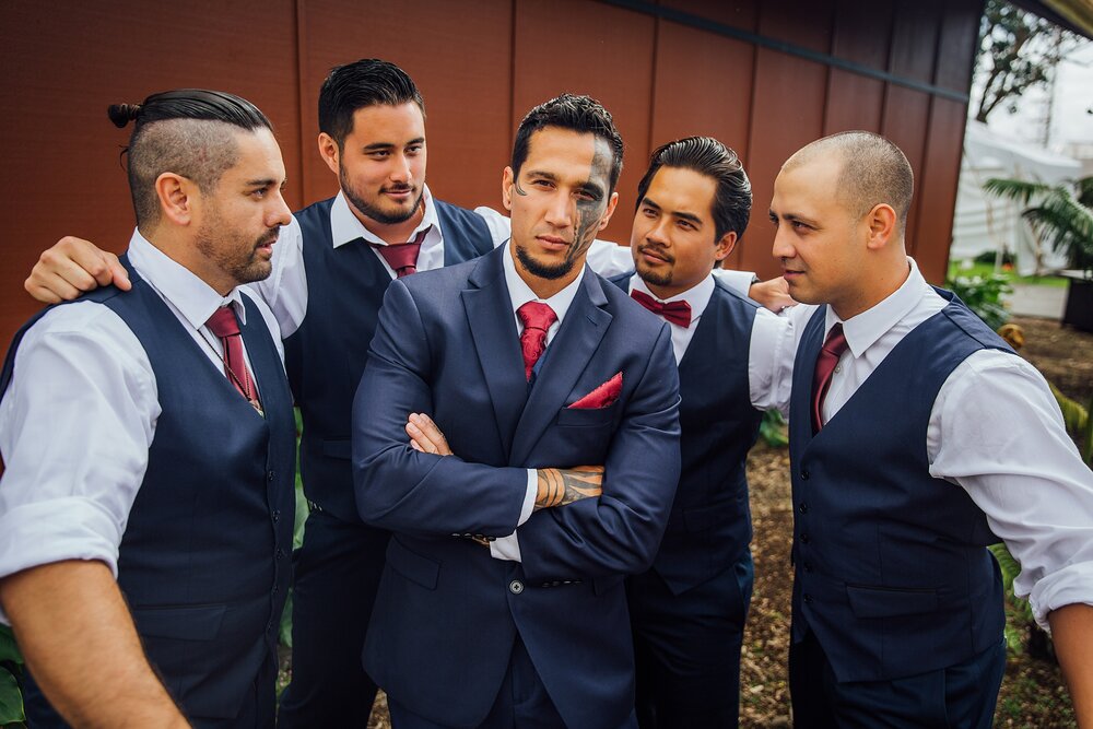 groom with his wedding party by Hawaii photographer