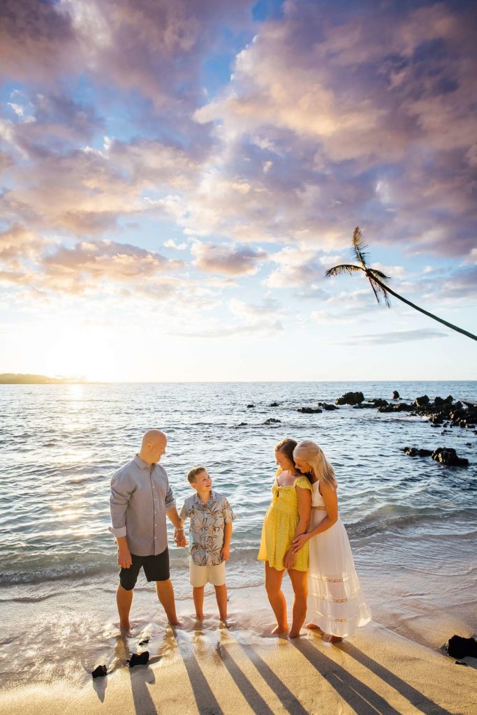 Hawaii family on the beach at sunset