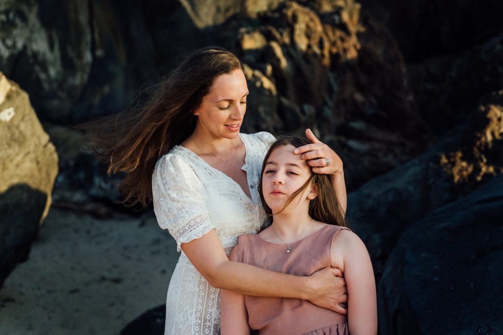 candid moments of mom and daughter by family photographer