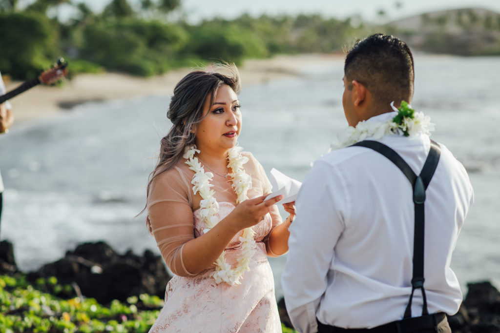 emotional exchange of vows during a Hawaii wedding