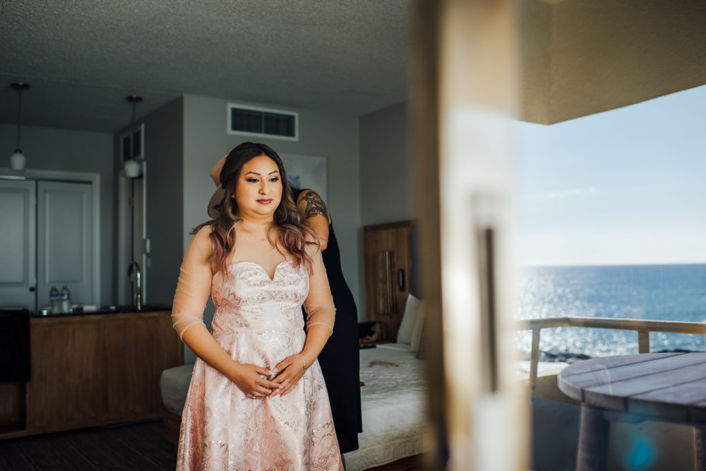 bride getting ready in her room at Royal Kona