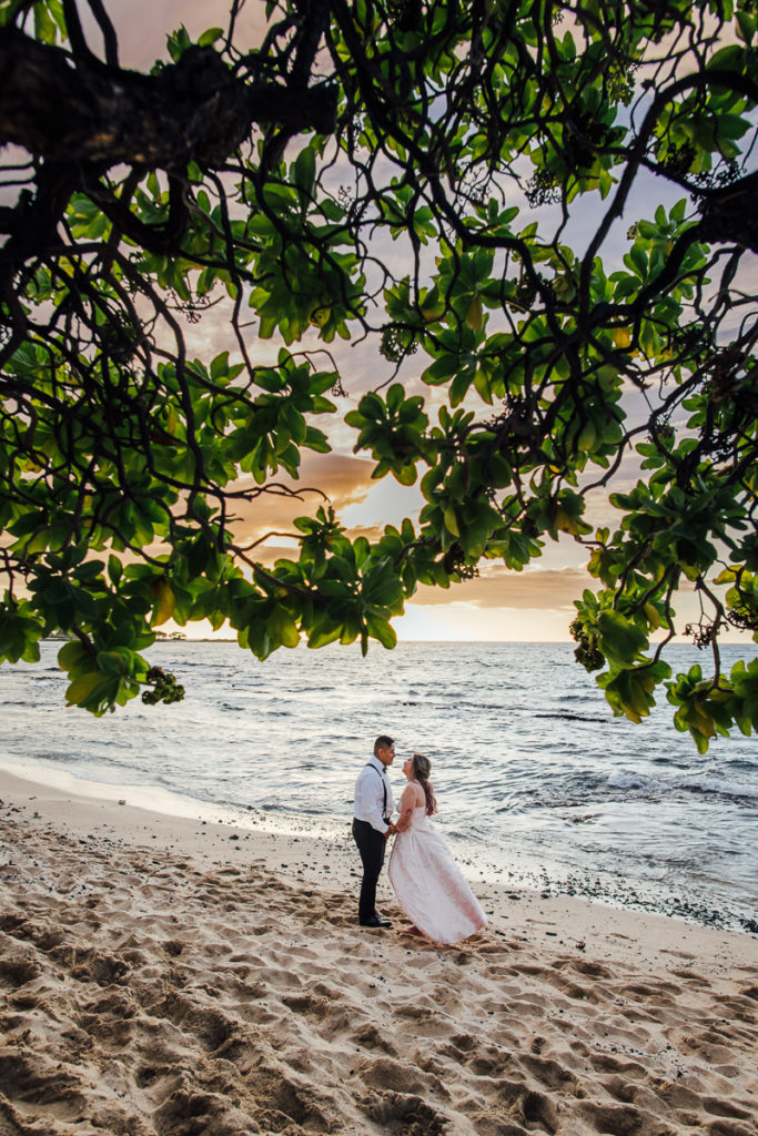 sweet moments with bride and groom at the beach