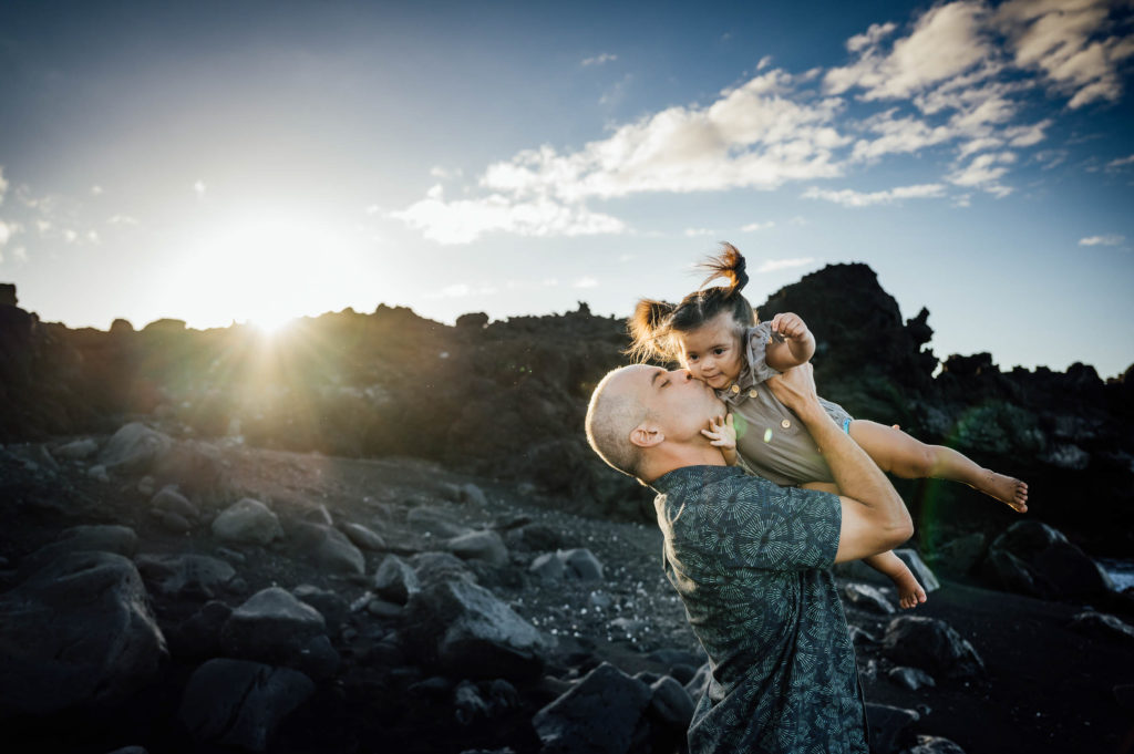 sweet father's kiss to his daughter by Big Island photographer