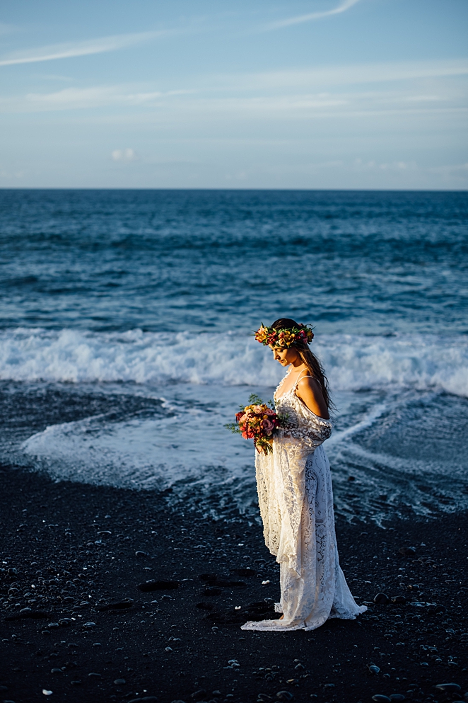 stunning bride on the black sand by the beach location for big island photography