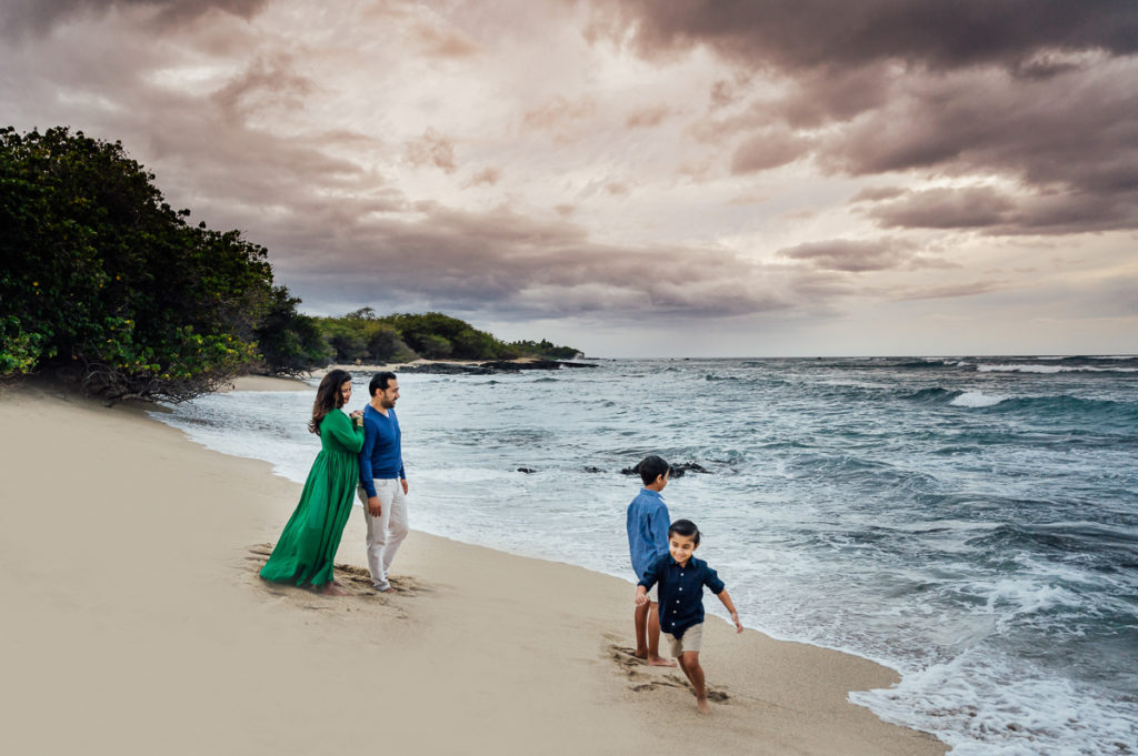 family choosing the white sand beach for their location