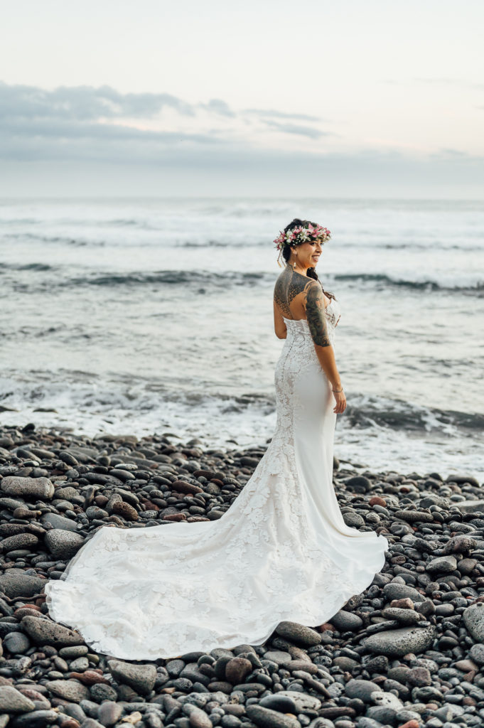 bride smiling on the beach during her adventure elopement