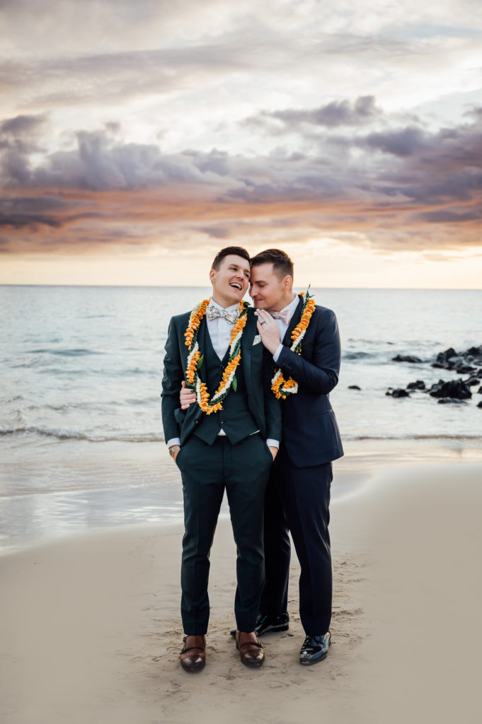 precious moments of the newlyweds at the beach during sunset
