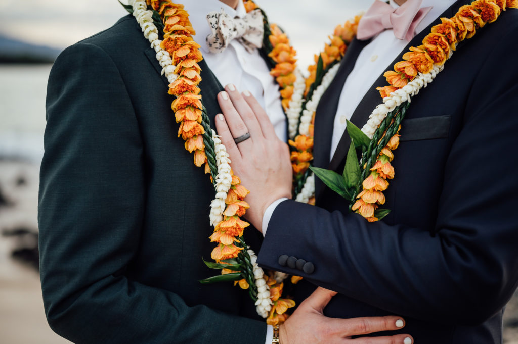 the wedding ring and the gorgeous leis