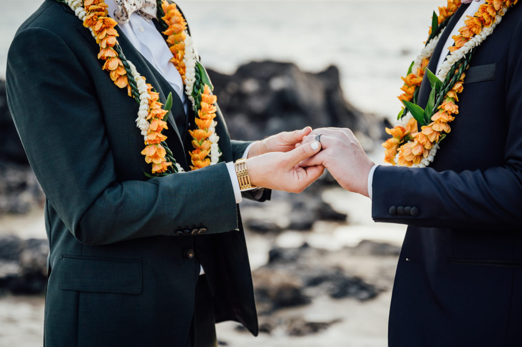 wedding couple holding hands during Big Island wedding ceremony