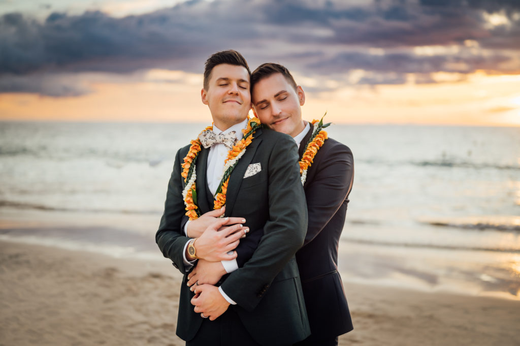 married couple's sweet embrace during Westin Hapuna sunset
