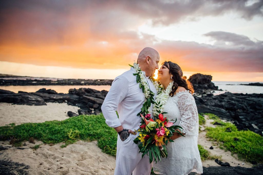 sweet moment between bride and groom after their Hawaii wedding