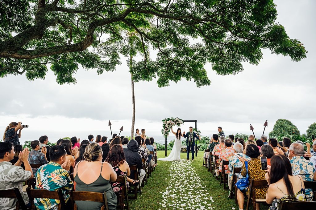 photo of the bride and groom and their guests during their Big Island wedding ceremony