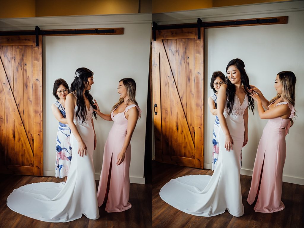 bride getting ready with her mom and maid-of-honor 
