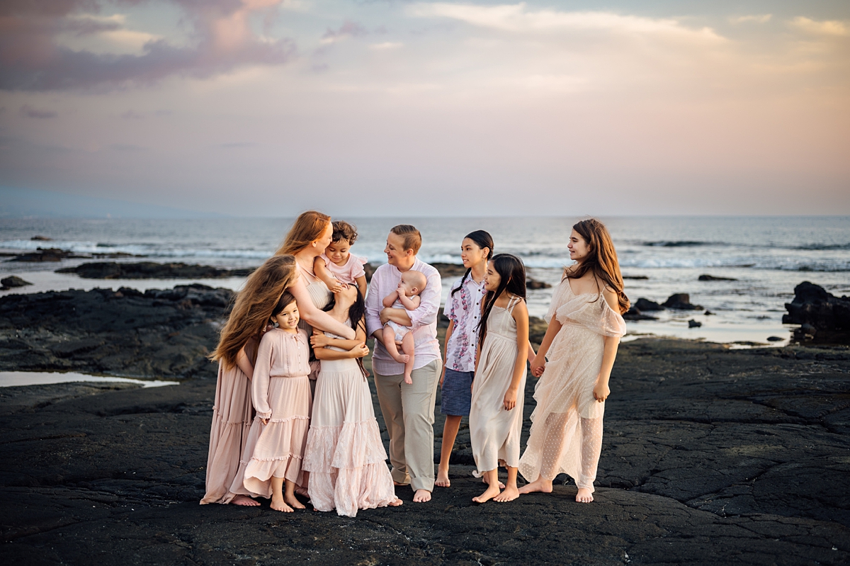 candid family photo in a beach in Kona, Hawaii