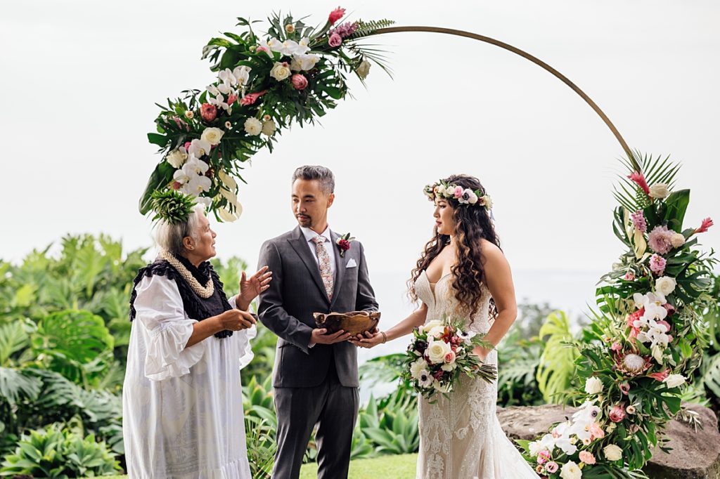bride and groom with their Hawaii wedding officiant