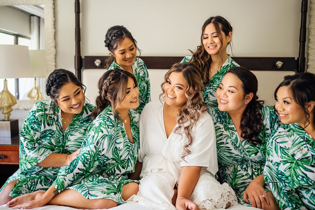 bride and her bridesmaids in their robes at Fairmont Orchid