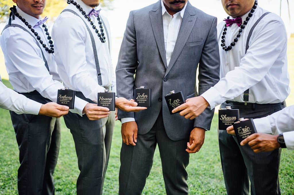 groom and his groomsmen with hip flasks at Fairmont Orchid