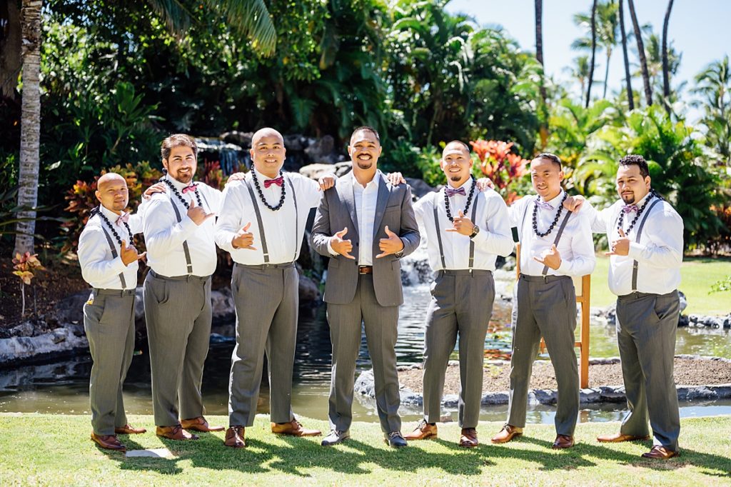 happy groom and his groomsmen during his Hawaii wedding