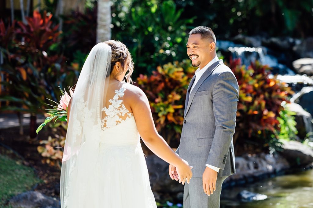 bride and groom's first look at Fairmont Orchid