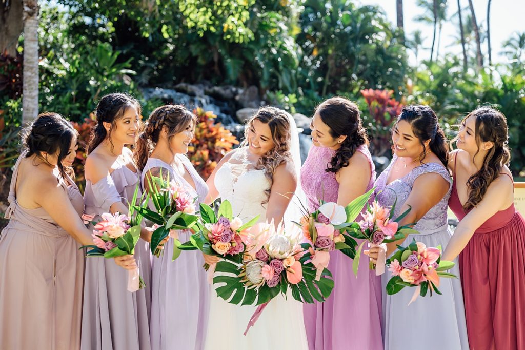 happy bride and bridesmaids during her Big Island, Hawaii wedding