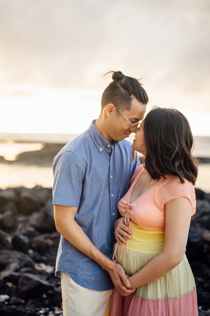 sweet moments of the couple during sunset in Kona, Hawaii