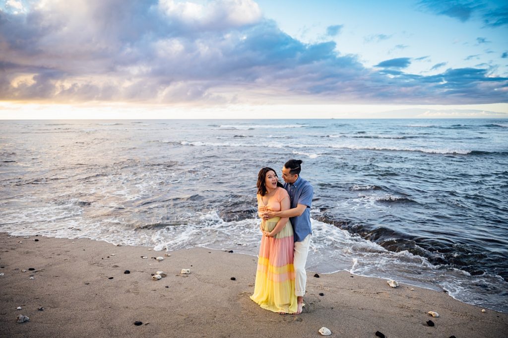 happy couple at the beach by Hawaii photographer