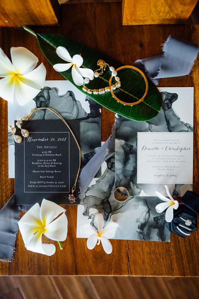 invitation and bridal jewelry at Mauna Lani wedding