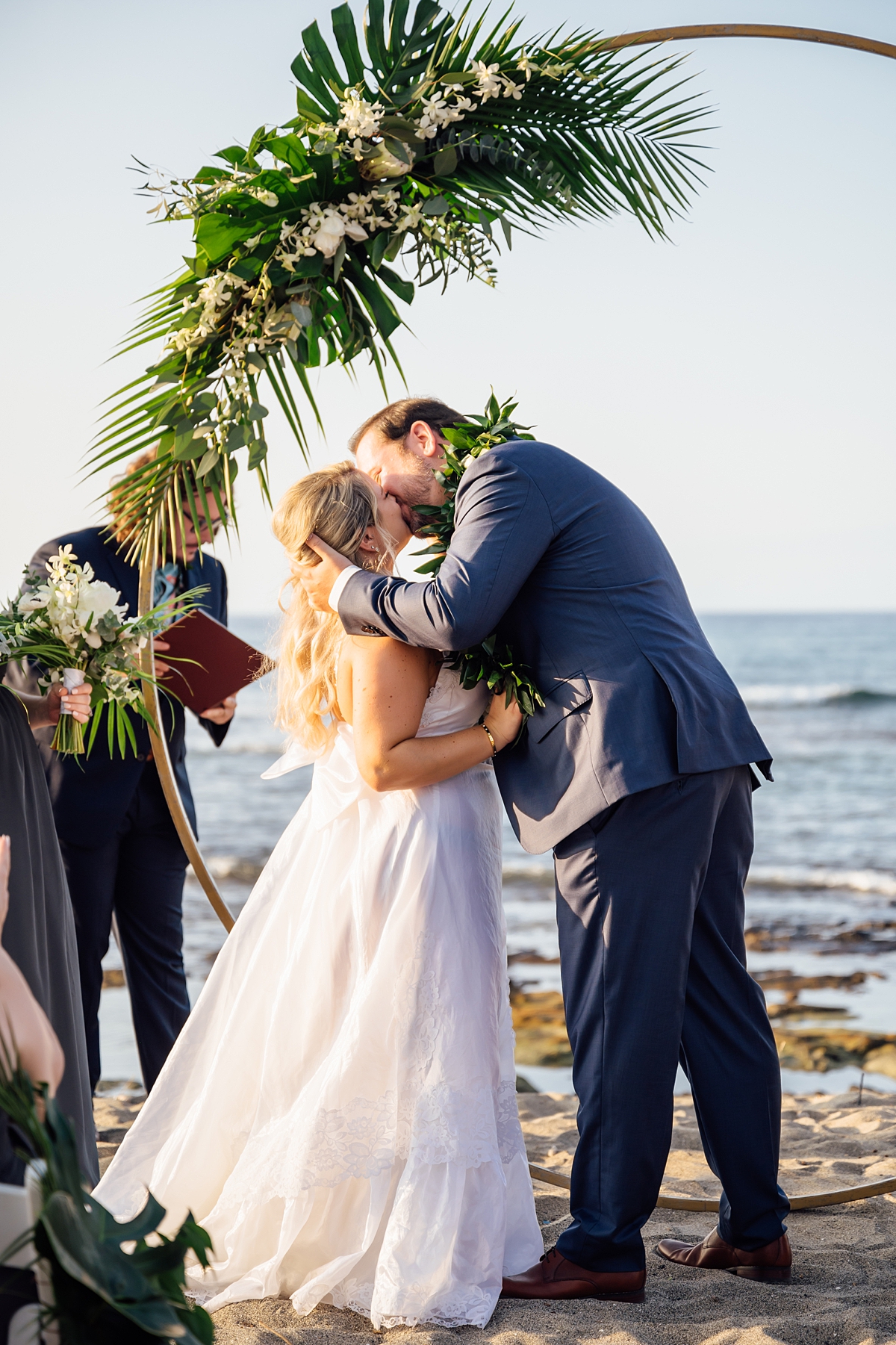 bride and groom kiss duringtheir Big Island wedding ceremony