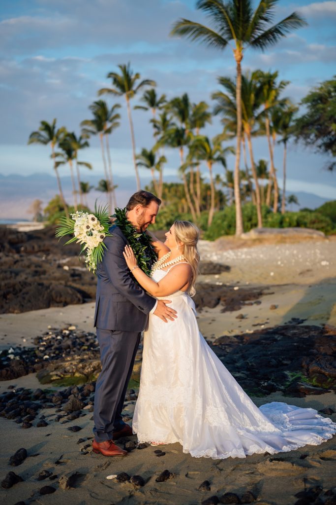 bride and groom looking at each other on a Big Island beach