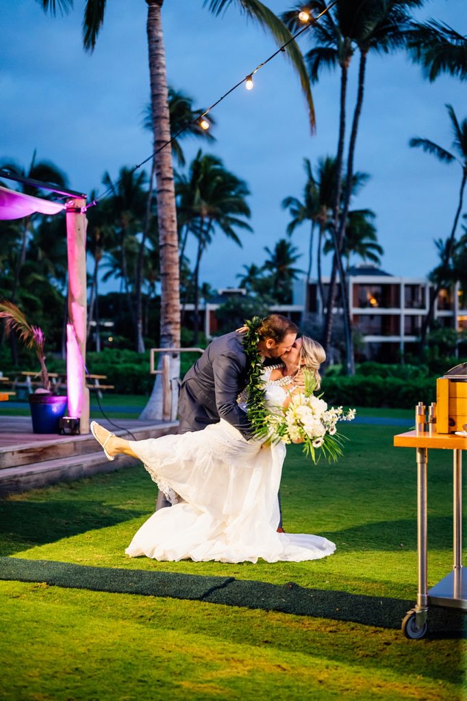 bride and groom kiss during their Mauna Lani wedding