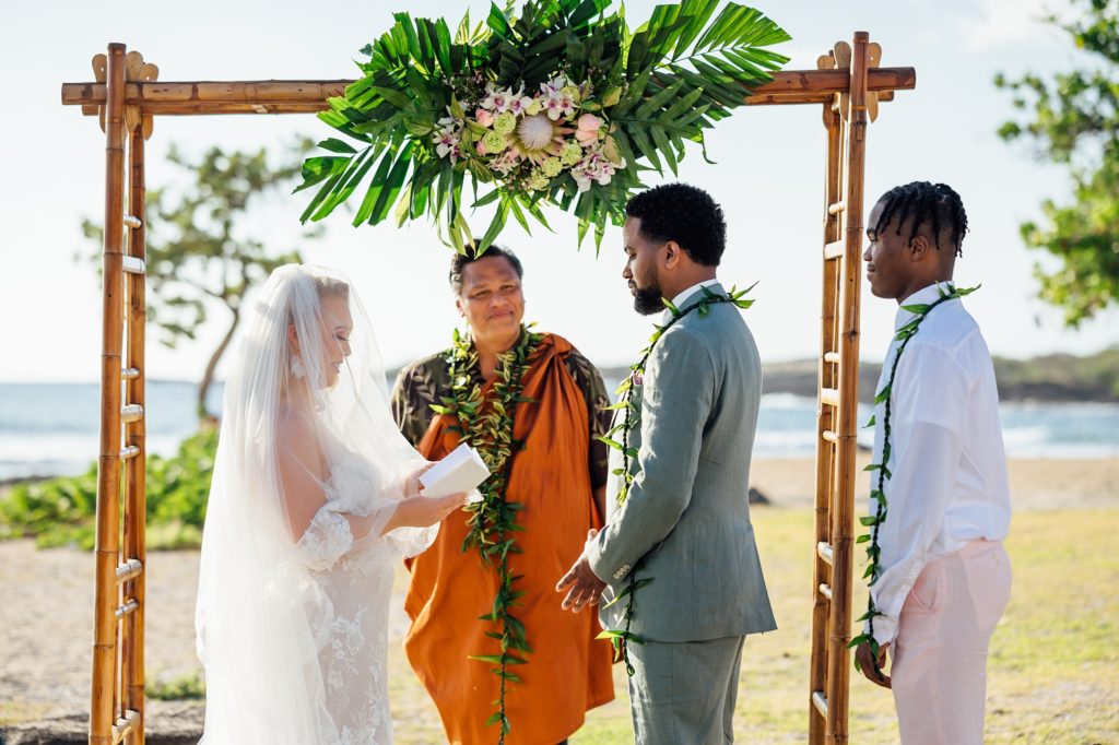 bride giving her vows during her Hawaii wedding ceremony
