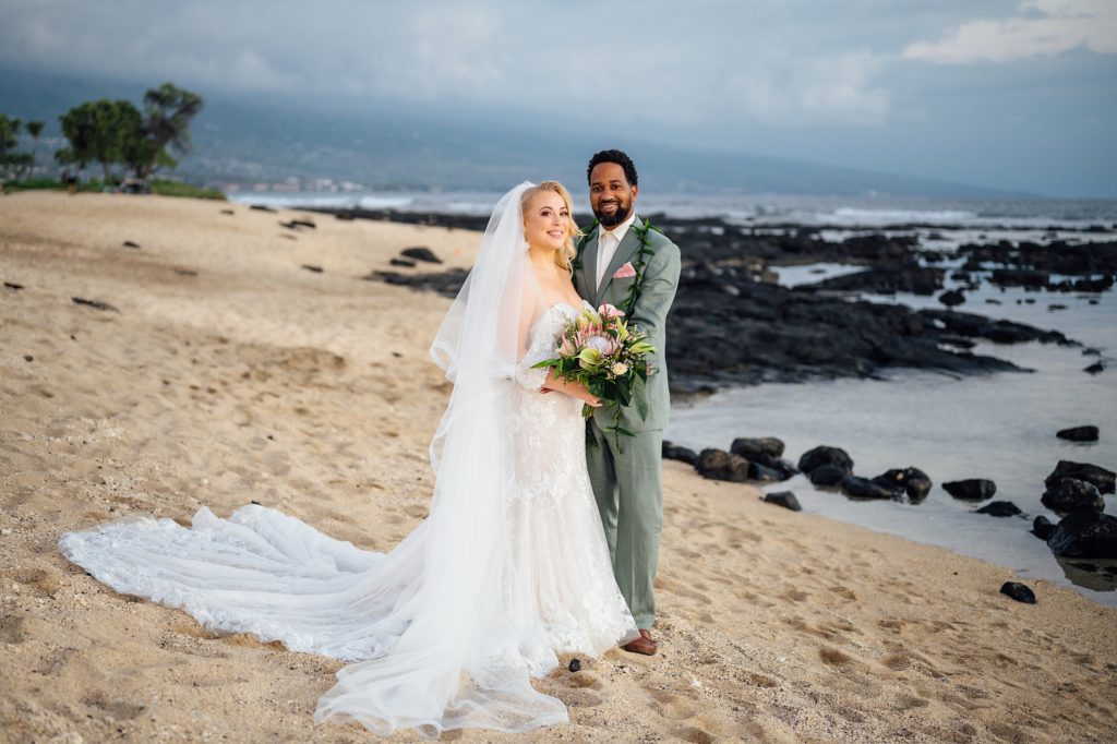 bride and groom at the beach during their Hawaii wedding