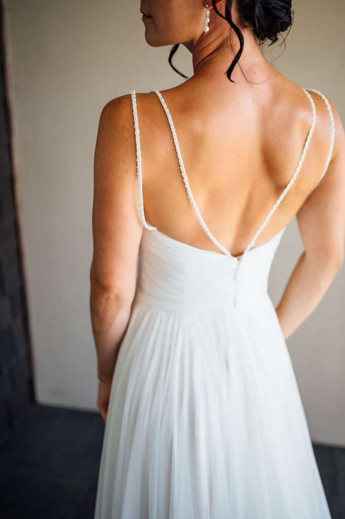 back details of the bride's dress by wedding photographer