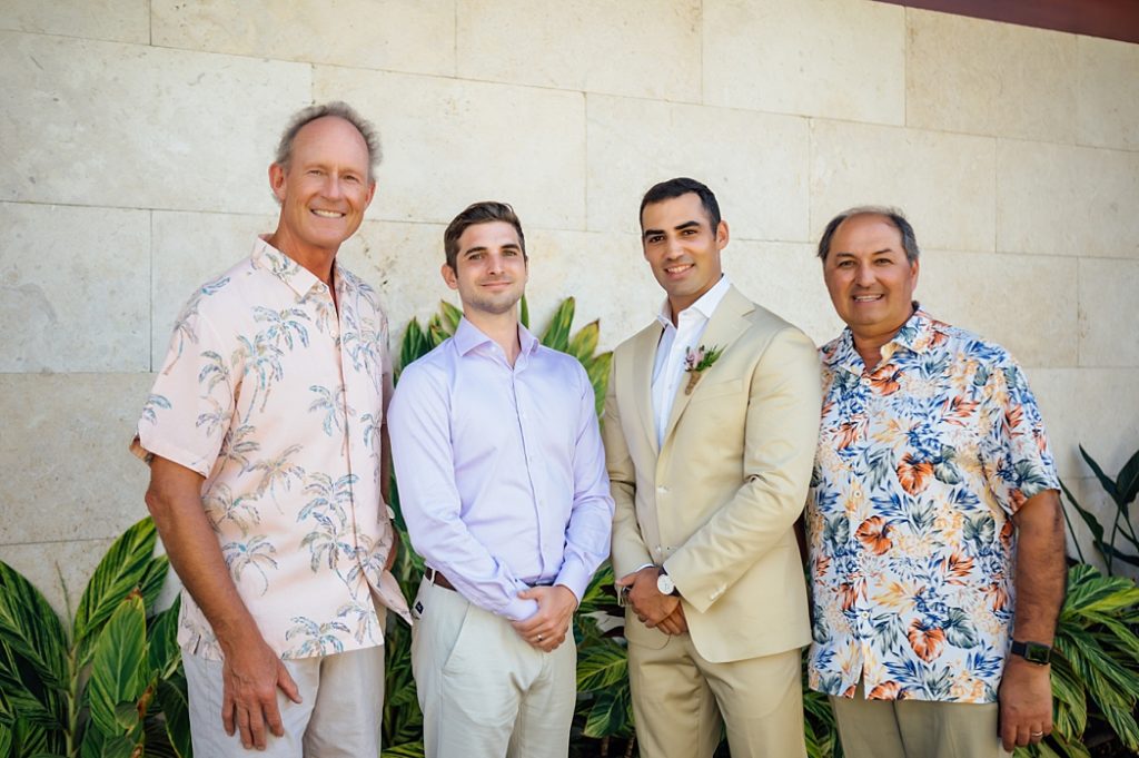 groom with his dad, groomsman, and bride's dad by Big Island photographer