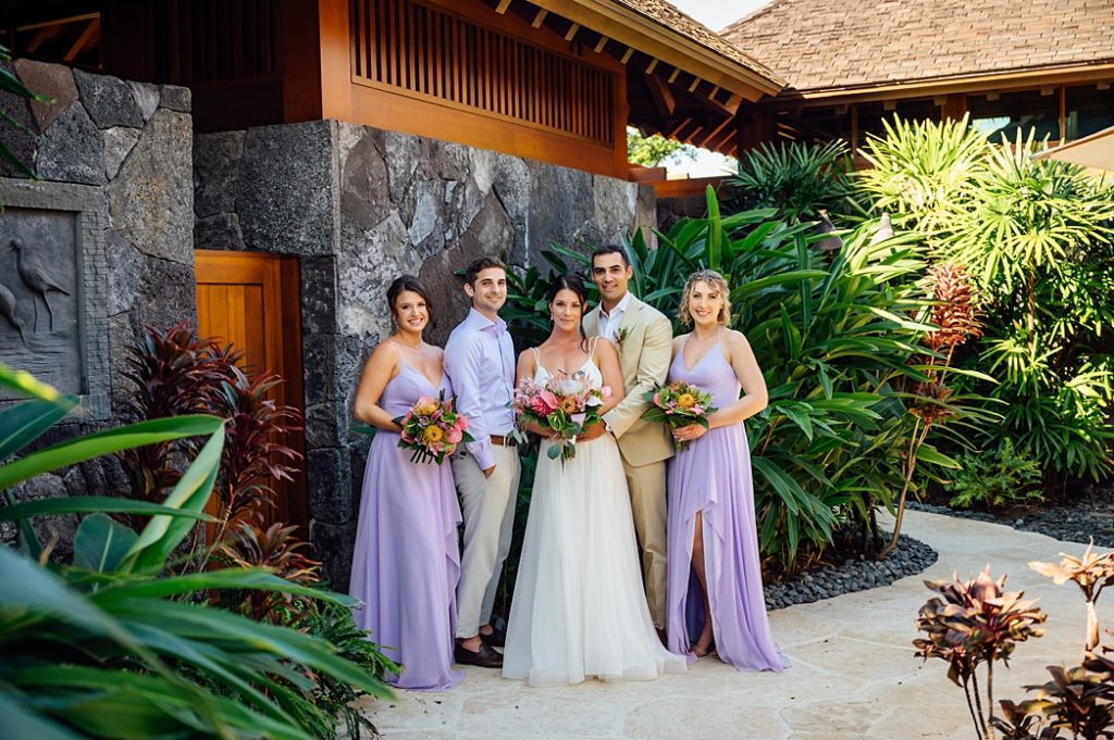 bride and groom with their wedding party on the Big Island 