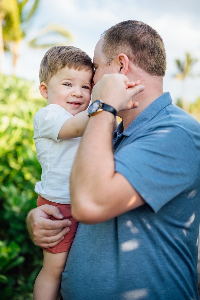 candid moments with dad and son by Hawaii photographer