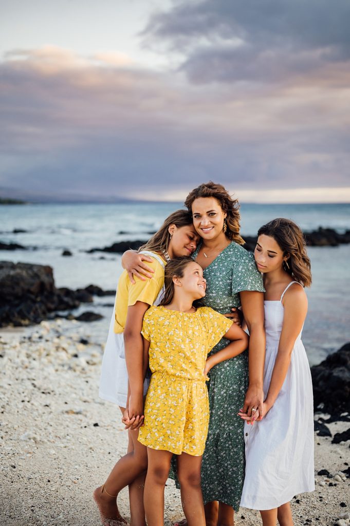 precious moments of mom and daughters during their beach vacation